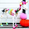 Fun Express 27″ Unicorn Skeleton Plastic Halloween Decoration with Glowing Eyes – Premium Outdoor Yard Decor for Porch, Garden & Lawn | Weather-Resistant Large Halloween Decorations
