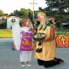 Fun Express Christian Pumpkin Plastic Gift Bags 50 Pack – Fall Halloween Treat Bags with Handles for Church Trunk or Treat Events | Religious Party Favors for Sunday School & Fall Festivals(Multicolour)