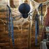 Fun Express 7 Ft. Large Black Hanging Honeycomb Tissue Paper Spider Halloween Decoration