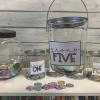Fun Express 1 1/2″ Bulk 144 Pc. Multicolored Motivational Kindness Plastic Coins, Great for Classroom and Church Activites(1)