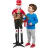 Festive Animated Standing Nutcracker Decoration with Wreath – 16″ x 46″ (1 Pc.) – Perfect for Christmas Decor, Holiday Displays, or Seasonal Celebrations
