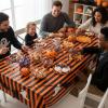 Fun Express 54″ x 108″ Halloween Orange & Black Striped Disposable Plastic Tablecloth