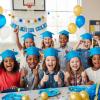 Fun Express Blue Graduation Cap Crowns 12 Pieces